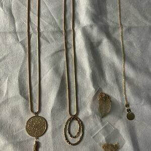 7 golden necklaces, leaf, triangle,